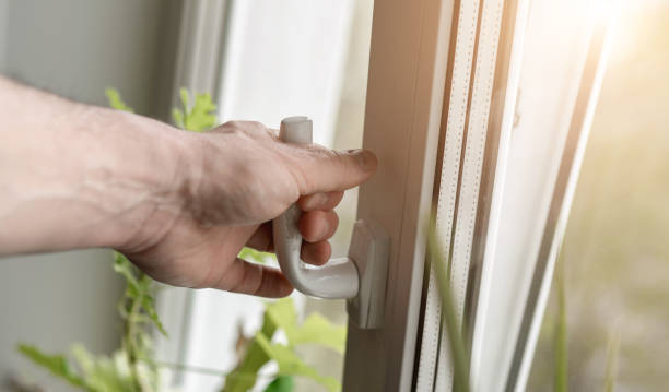 istock male hand opening pvc window frame for room ventilation 1283142345