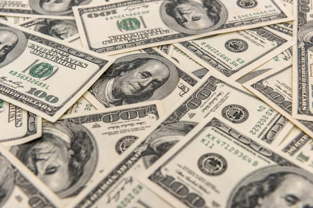 istock pile  of old 100 dollar bills as background 1283143236