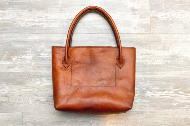 istock Handmade brown tote leather bag 1283147500