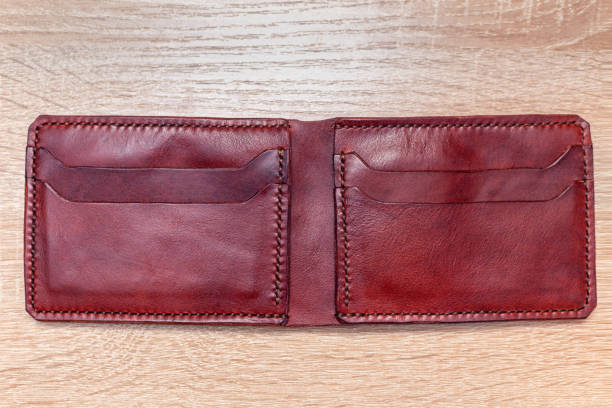 istock Handmade leather bifold natural full-grain leather wallet purse pouch 1283147505