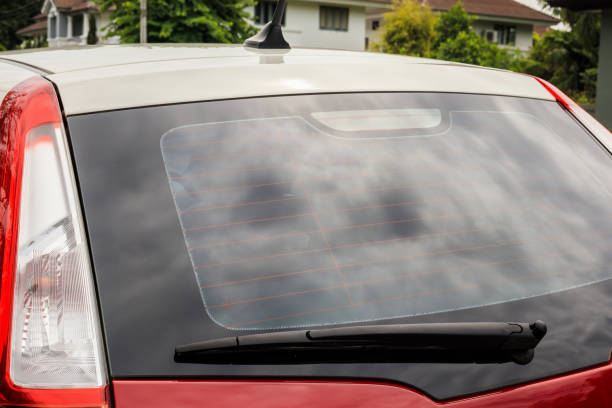 istock Back view of red car window for sticker mockup 1283151121