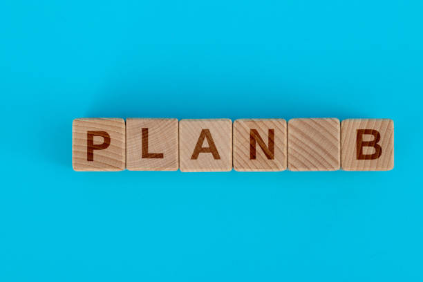istock Wooden toy blocks with word plan b 1283154644