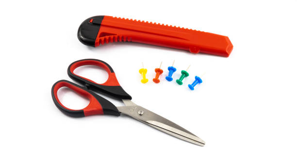 istock Schoolboy student stationery set pins paper clips scissors, on white isolated background 1283158367