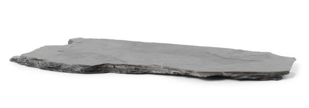 istock Black stone tray isolated on white background 1283162486