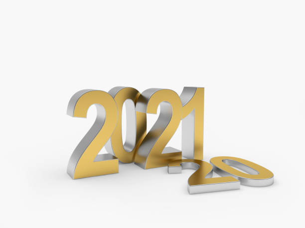istock Number 2021 stands and number 20 lies 1283166973