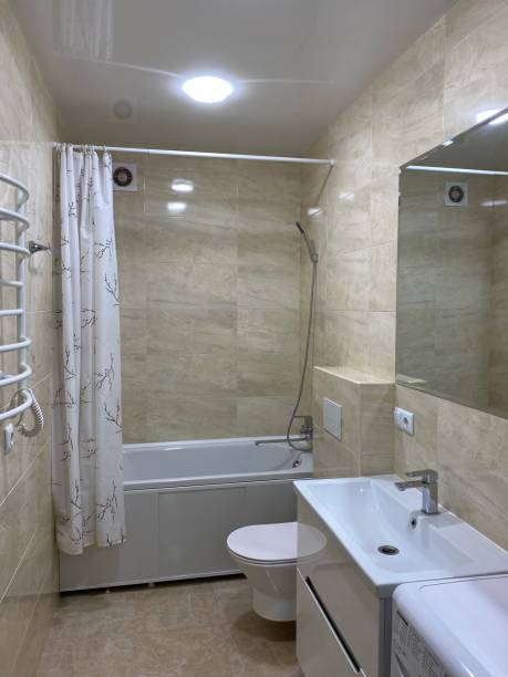 istock bathroom with washbasin and bathtub 1283168541