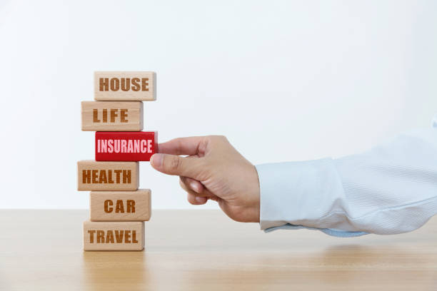 istock Wooden blocks with the word insurance 1283171042