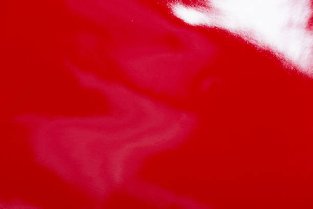 istock Red glossy leather for background usage. Can be used as background in art or design projects. 1283171644