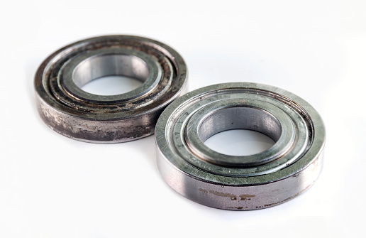 Bearings for parts of industrial machines on white background.