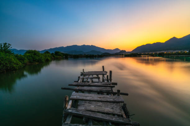 istock Abandoned wooden bridge on Quan Tuong river 1283173944