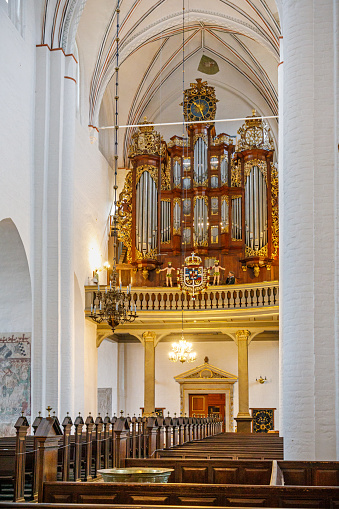 The organ in the church and the carved old wooden around