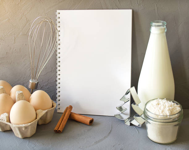 istock Christmas Baking background with eggs, flour, milk on a concrete background. Delicious and healthy food. Place for text 1283177294