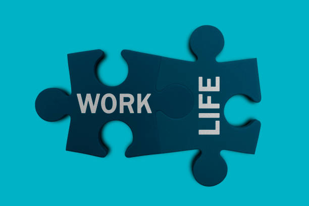 istock Work and life words written on two pieces of jigsaw puzzle 1283180023