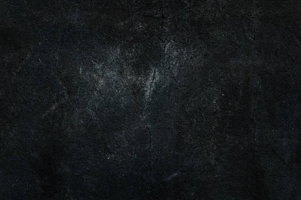 istock White dust on the black surface of an old wall 1283182311