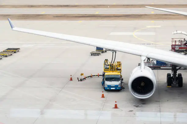 Authorities are fueling aircraft of the Singapore Airlines before flying at Incheon International Airport, South Korea.