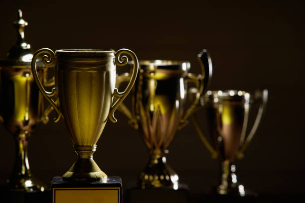 istock trophies on the black background 1283185300