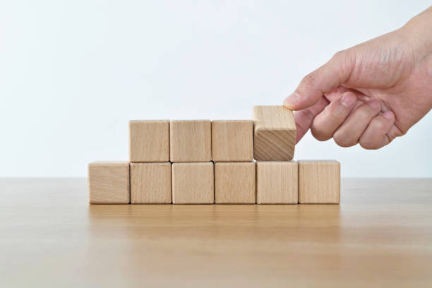 istock One of the group blocks turns one side 1283192696