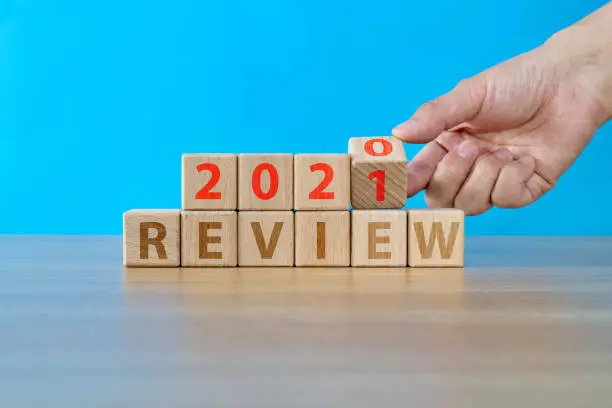 Photo of 2020 review text on wooden blocks
