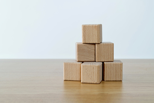 Pyramid are made of wooden blocks.