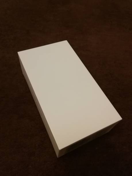 istock White box without an inscription, placed on a brown background 1283194681