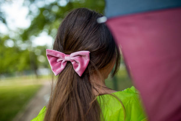 istock Brunette With Bow in Her Hair 1283197302