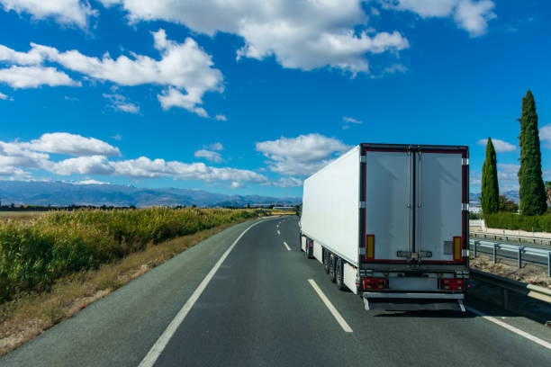 istock Truck with refrigerated semi-trailer driving on a highway 1283198654