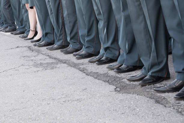 istock row of legs on parade in uniform 1283200030