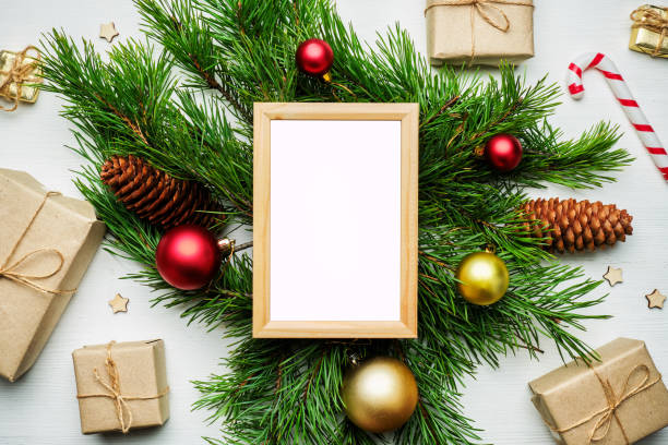 istock New year and christmas concept on wooden background with frame for copy space 1283201126