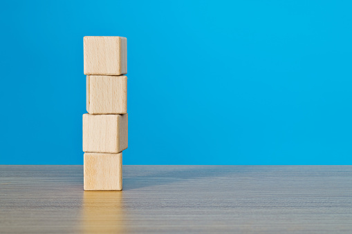 Wooden blocks stack on the table.