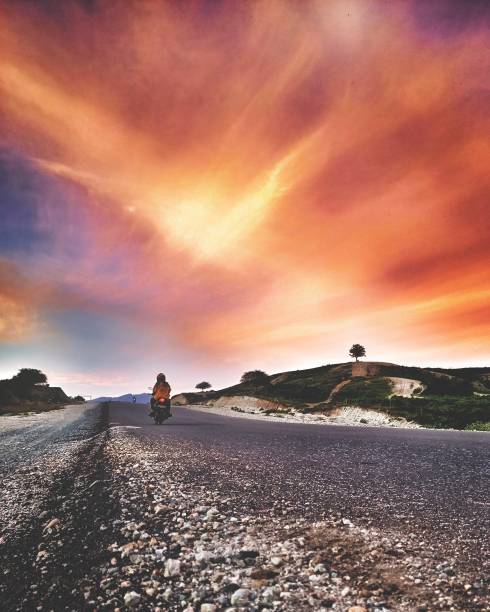 istock Road at the sunset, Indonesia 1283201518