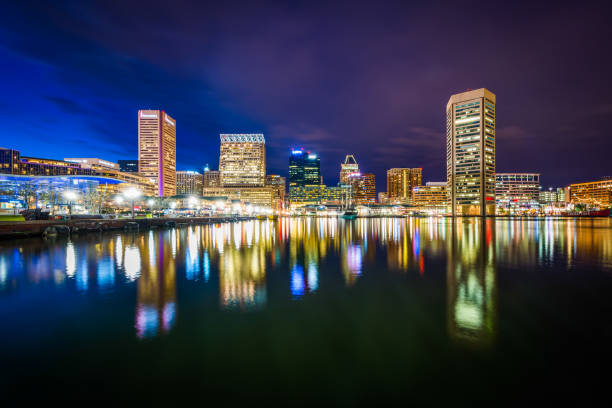 istock The Inner Harbor skyline at night, in Baltimore, Maryland 1283203017
