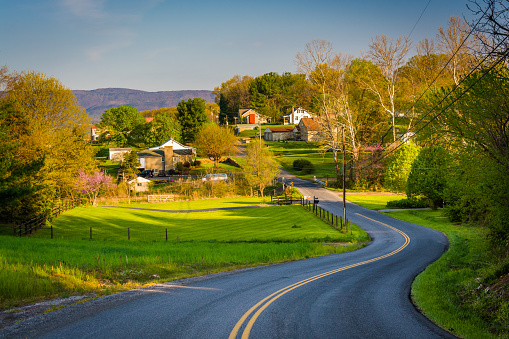 Windy country road and view of farms and houses in the Shenandoah Valley of Virginia