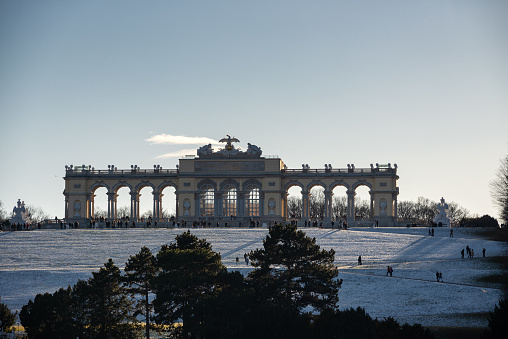 Gloriette in the Schonbrunn Palace Schloss Schönbrunn in winter, beautiful color on late afternoon with amazing clear sky, UNESCO World Heritage Site, Vienna, Austria, Europe