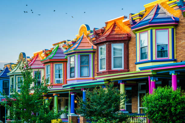 Colorful row houses on Guilford Avenue, in Charles Village, Baltimore, Maryland stock photo