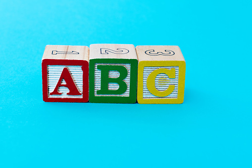 Wooden blocks with letters A B C.