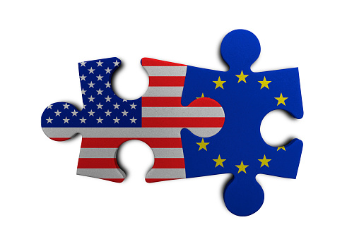 USA and EU puzzle from flags. Relations between the two countries