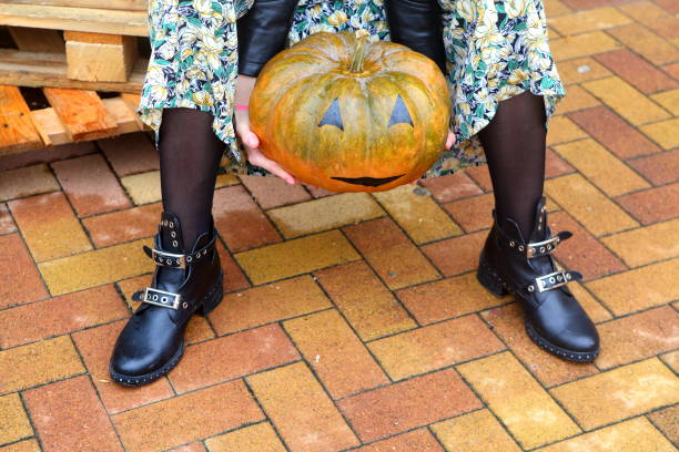 istock Decorating a room with a fireplace pumpkins 1283206955