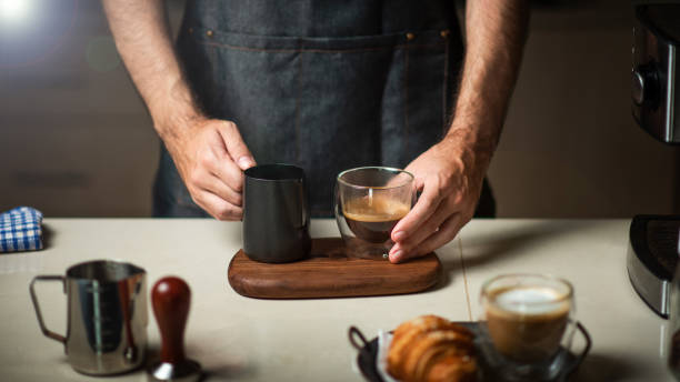 istock Pouring latte art and making cappuccino 1283207224
