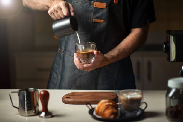 istock Pouring latte art and making cappuccino 1283207240
