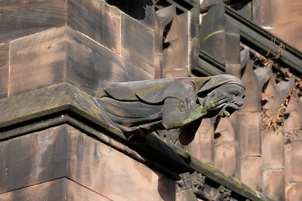 Grotesque gargoyle, Chester Cathedral,UK. stock photo