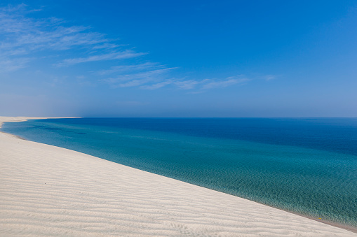 when the desert meets the ocean, inland sea or sealine desert in qatar.