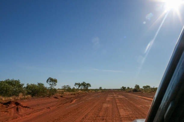 Short rest on Tanami Road from Alice Springs to Broome, near Wolf Creek Meteor Crater, 1000km unsealed road, red sand, outback stock photo