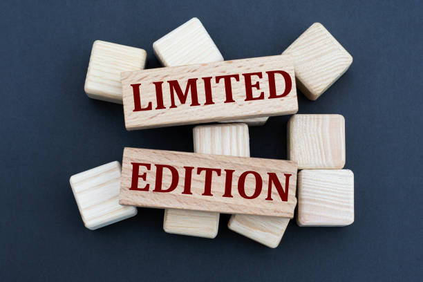 istock LIMITED EDITION - words on wooden bars on cubes on a gray background 1283213182