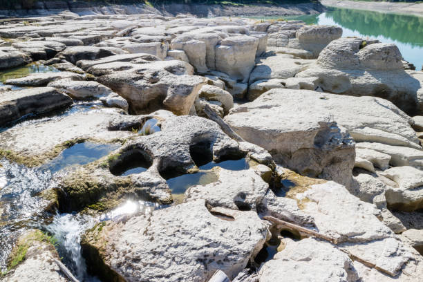 istock Impressive rock formation in the Ain river, Jura 1283214598