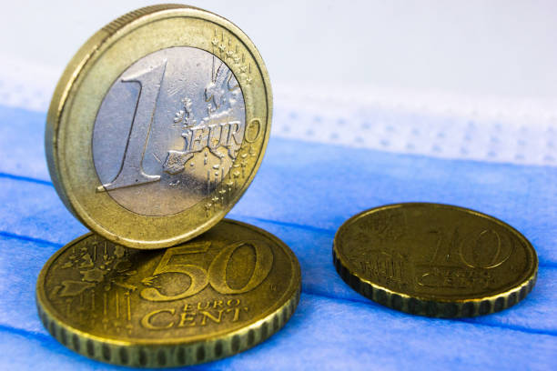 istock the coins are on the medical mask 1283214672