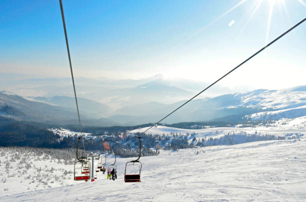 istock Traveling up a ski lift. Ski Resort 1283215572
