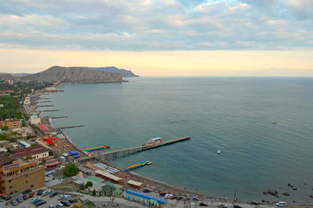 istock sea landscape view of beach and mountains 1283215665