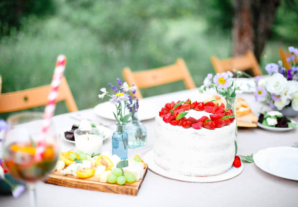 istock Cake on banquet table in garden 1283216912