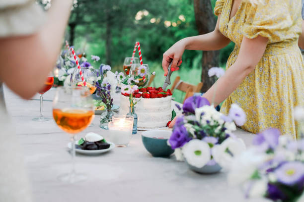 istock Crop woman cutting cake during banquet 1283217323