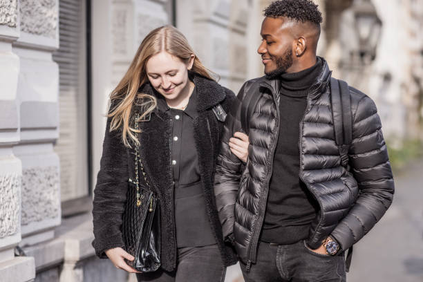 istock Mixed race couple walking in the street 1283218462